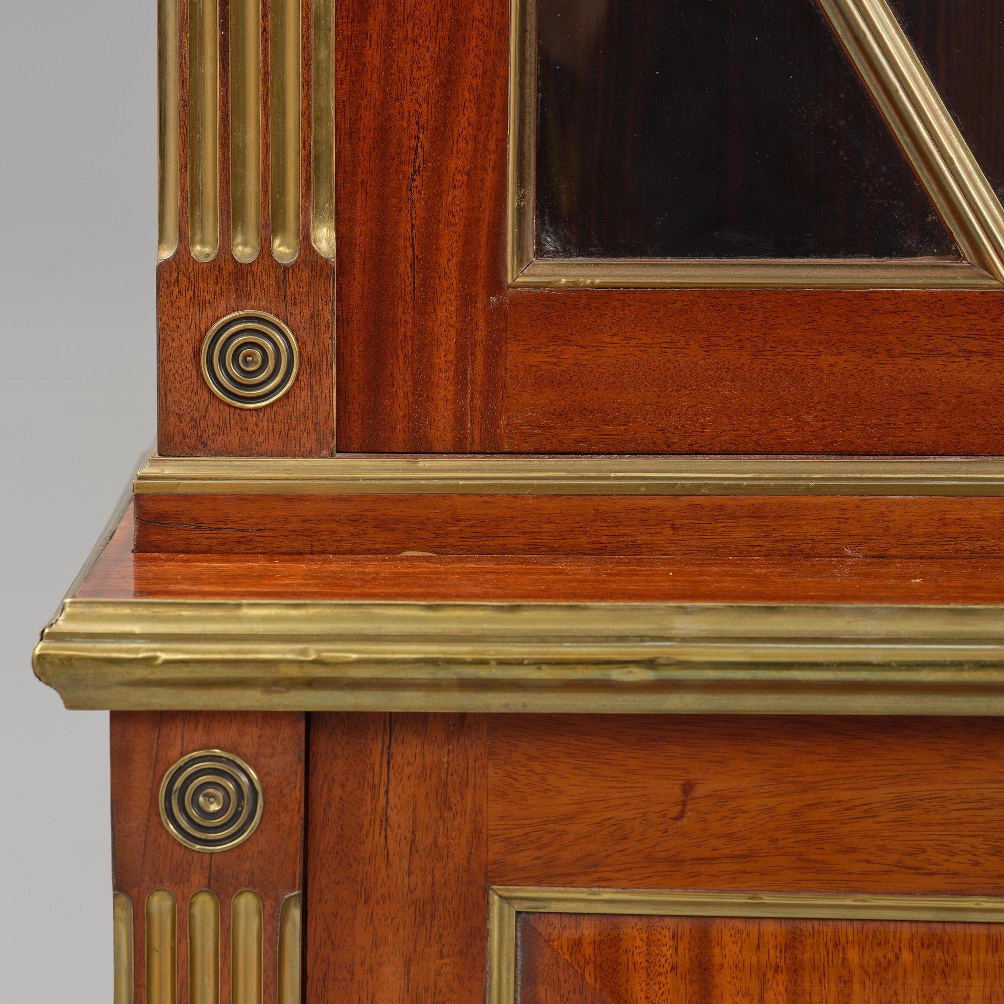 A pair of Russian mahogany and brass-mounted Jacob-style bibliothèques, modern with old parts.