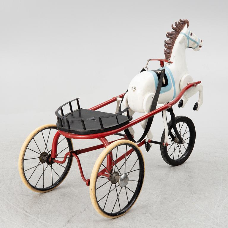 Toy horse with sulky, circa mid-1900s.