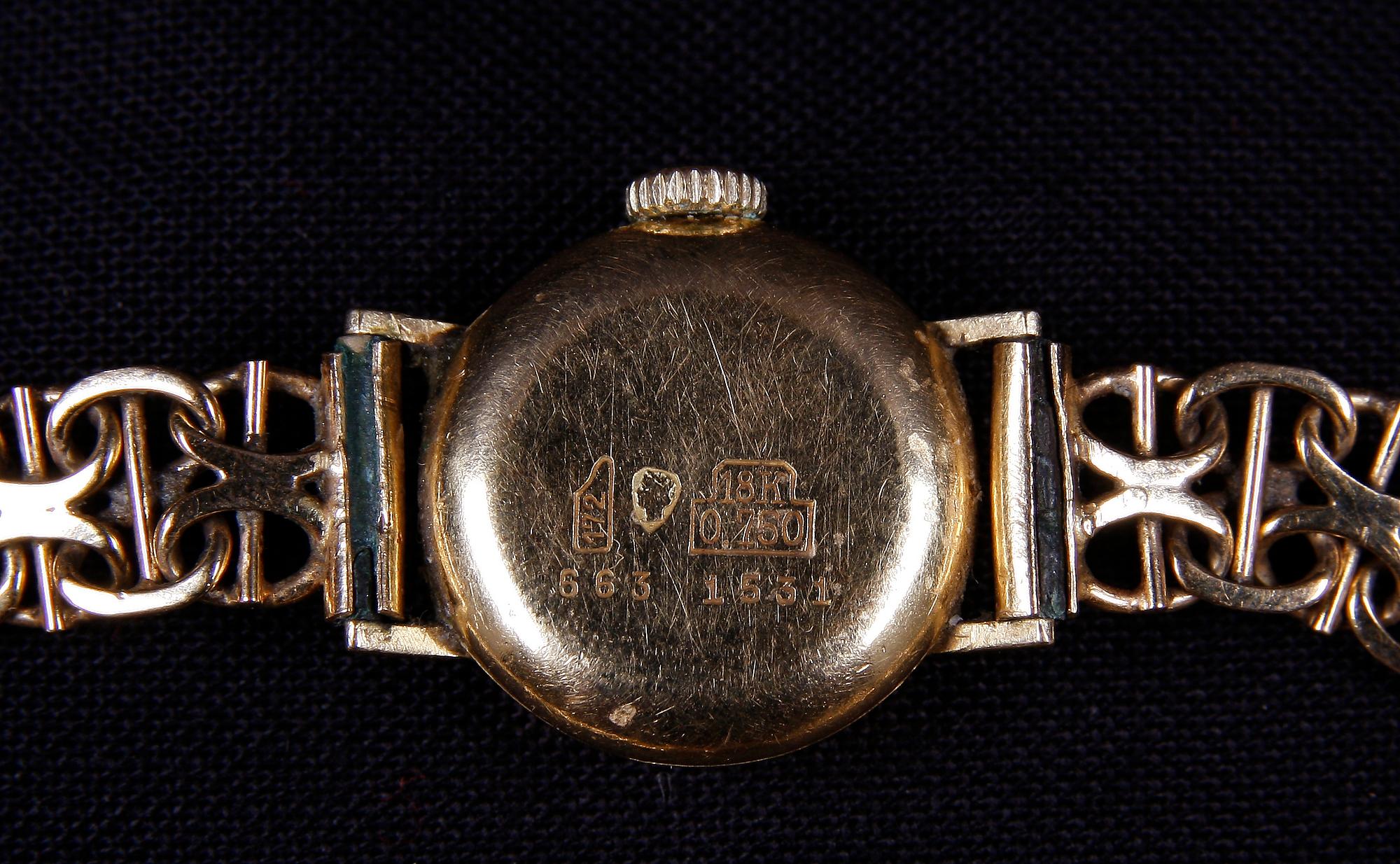DAMARMBANDSUR, 18 K guld, Örnen, 1969. Ca 16 g.