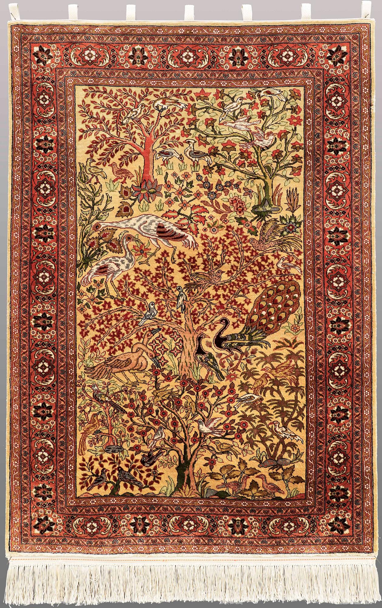 An Oriental figural silk rug, ca 126 x 83 cm.