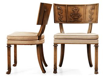 A pair of Axel Einar Hjorth 'Caesar' stained birch chairs by NK 1928.