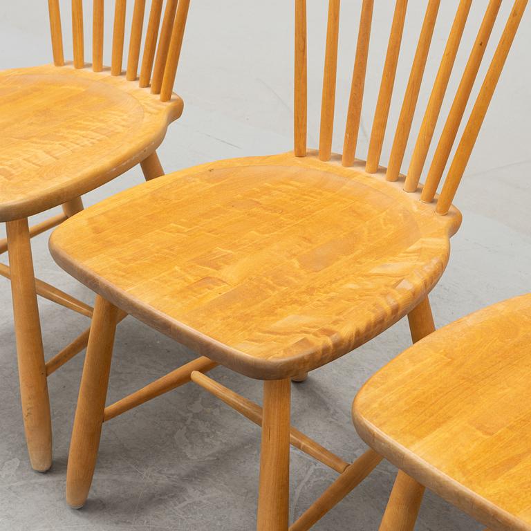 A set of four 'Lilla Åland' birch chairs by Carl Malmsten for Stolab dated 2000.