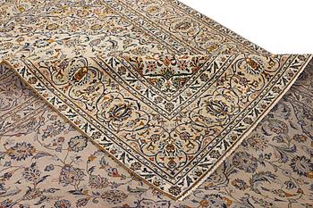 A Kashan carpet, c. 388 x 285 cm.