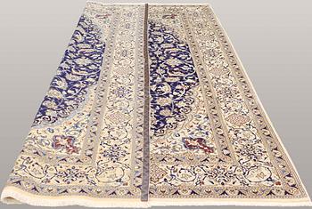 A carpet, Nain part silk, ca 353 x 253 cm.