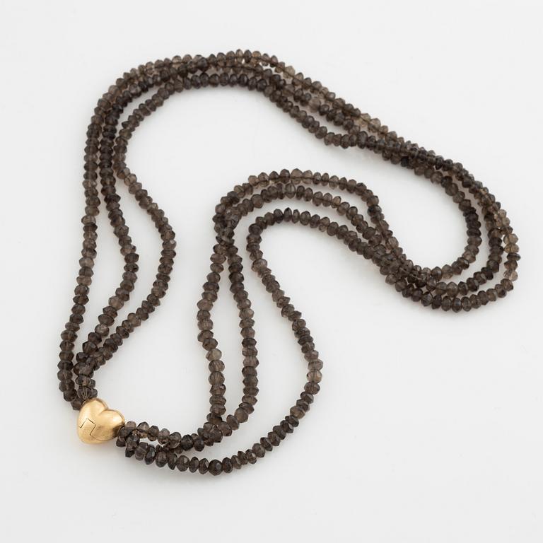Ole Lynggaard,  smoky quartz necklace, clasp gold heart.