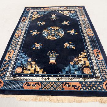 An old China carpet ca 274x183 cm.