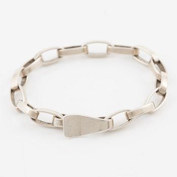 Sven-Erik Högberg samt Annette och Marie Högberg, ring, armband och collier.