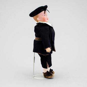 A bisque headed character doll 500 by Armand Marseille, Germany, ca 1910.