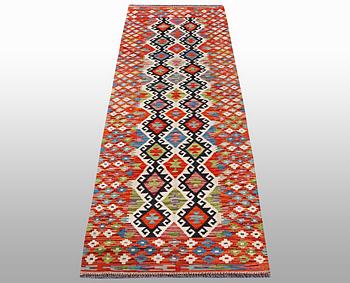 A runner kilim, ca 291 x 84 cm.