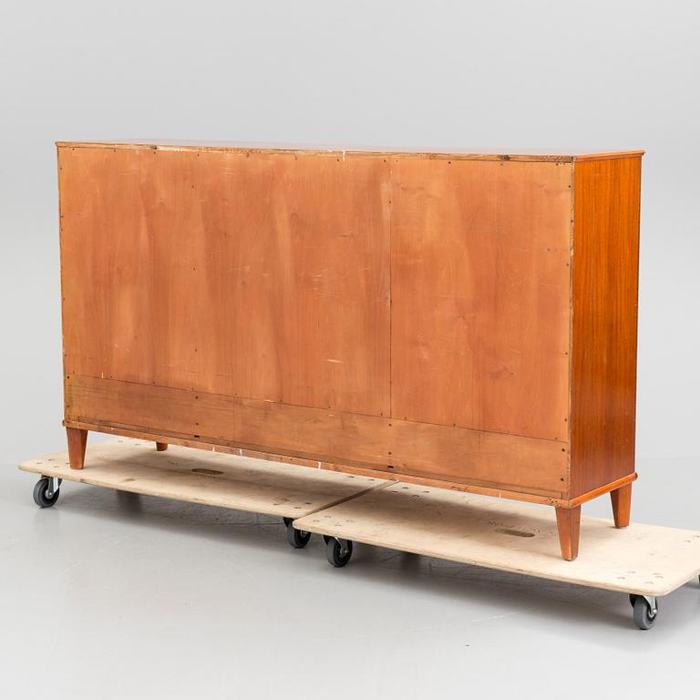 A 20th century mahogany sideboard with four doors.