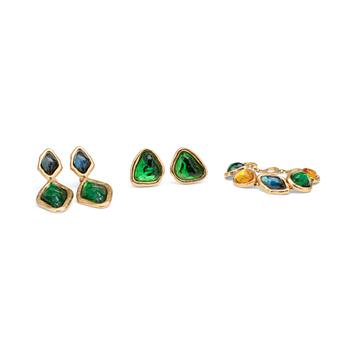 410. YVES SAINT LAURENT, a gold colored bracelet with glass stones  and two pairs of earclips.
