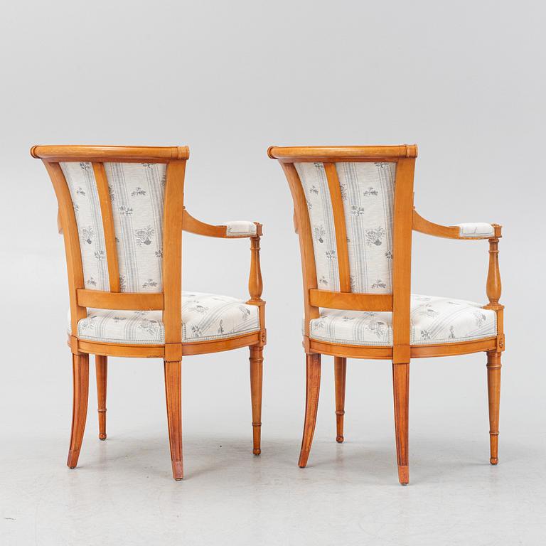 A pair of Louis XVI-style open armchairs, 20th century.