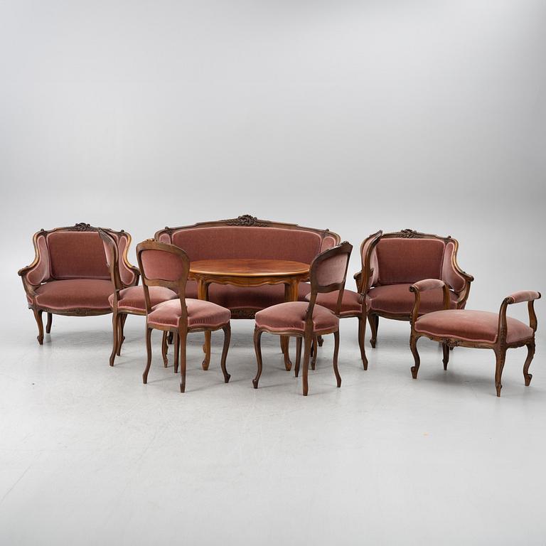 Sofa, 2 armchairs, 4 chairs, table and banquet, Rococo style, 20th century.