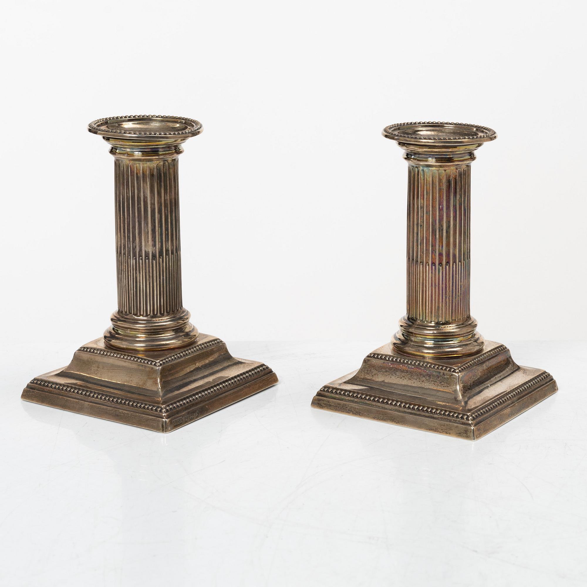 Hawksworth, Eyre & Co Ltd, a pair of silver candlesticks, Sheffield 1890.