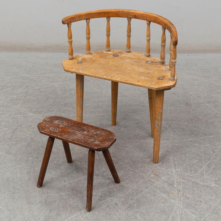 a swedish wooden chair with a stool from the 19th century.