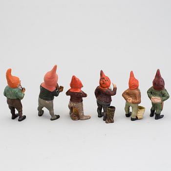 A lot of six painted terracotta santa claus figurines first half of the 20th century.