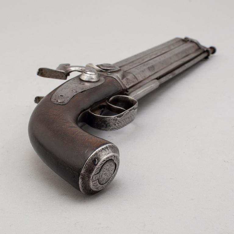 A second part of the 19th century double barreled over-and-under percussion pistol.