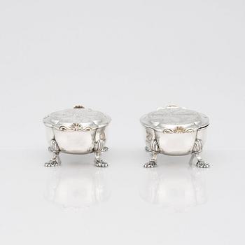A pair of Latvian Rococo silver salt and pepper stands, marks of Johan Christian Henck (Henke), Riga 1768-80.