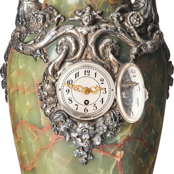 A monumental green onyx marble and silver mantel clock, W.A. Bolin, Moscow 1912–1917.