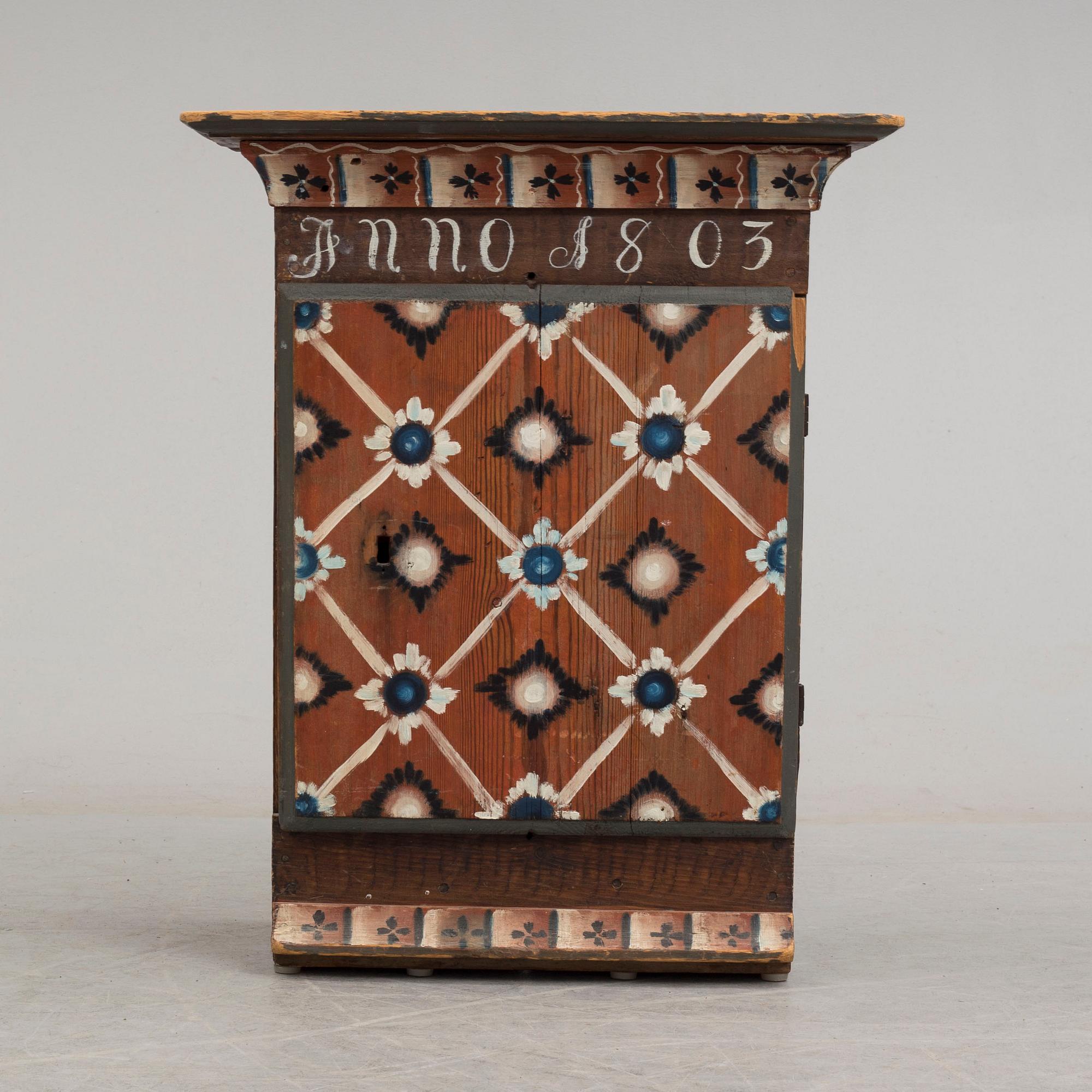 An early 19th century wall cabinet.
