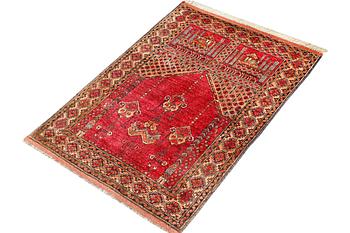 A silk Beluch rug, c. 124 x 81 cm.