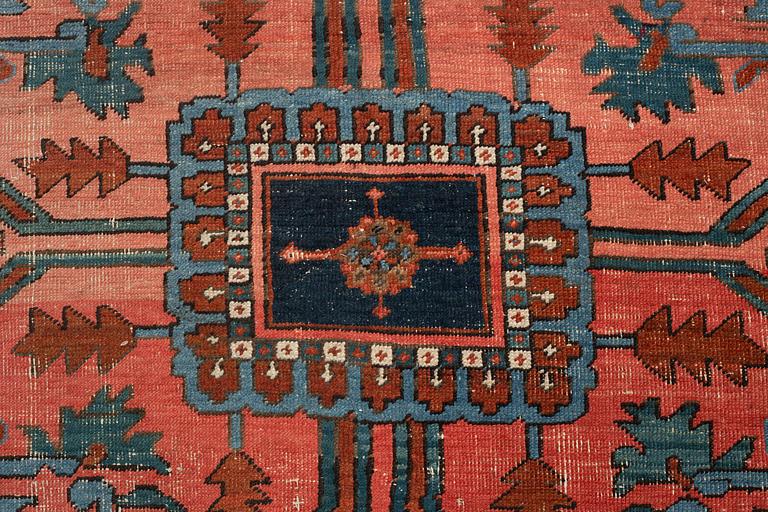 An antique Heriz Serapi carpet, West Persia, c. 616 x 407 cm.