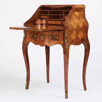 A rococo parquetry secretaire, Stockholm, later part of the 18th century.