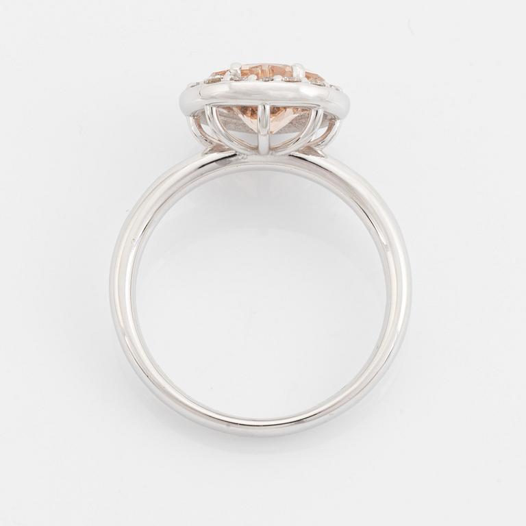 Heart shaped morganite and brilliant cut diamond ring.