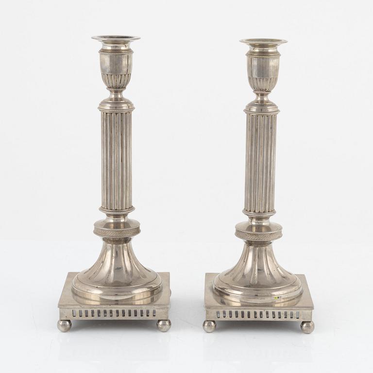 Carl Keijser & Co, a pair of Gustavian style candlesticks, first half of the 20th Century.
