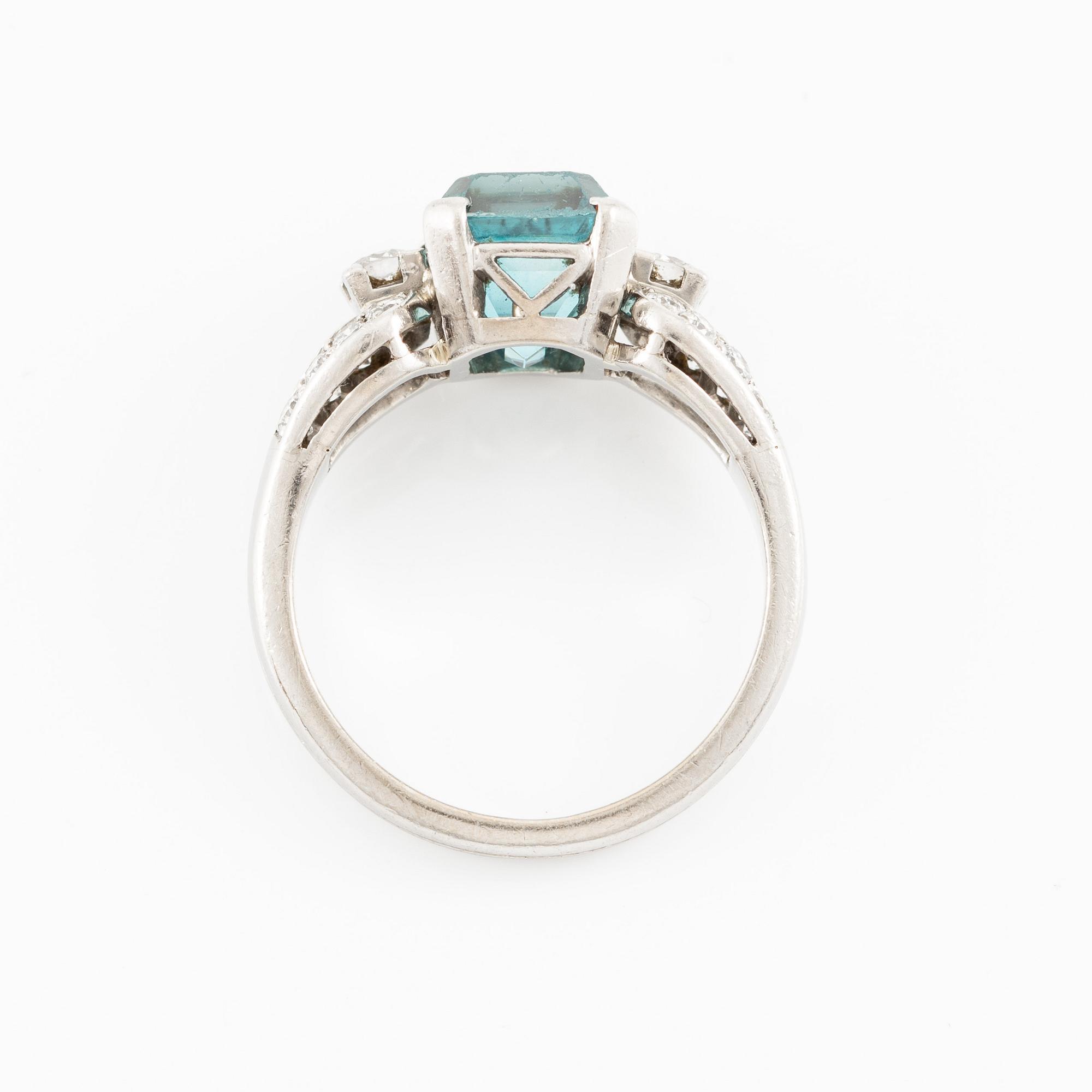 W.A. Bolin ring palladium med en zirkon och runda briljantslipade diamanter.