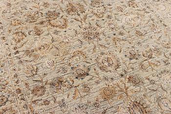 An Ushak Design, silk rug, a. 242 x 170 cm.