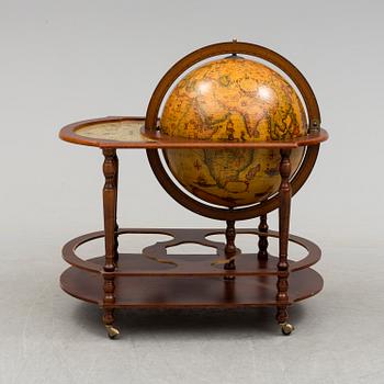 A globe shaped drinks cabinet, circa 2000.