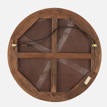 A round mirror. 1930's.