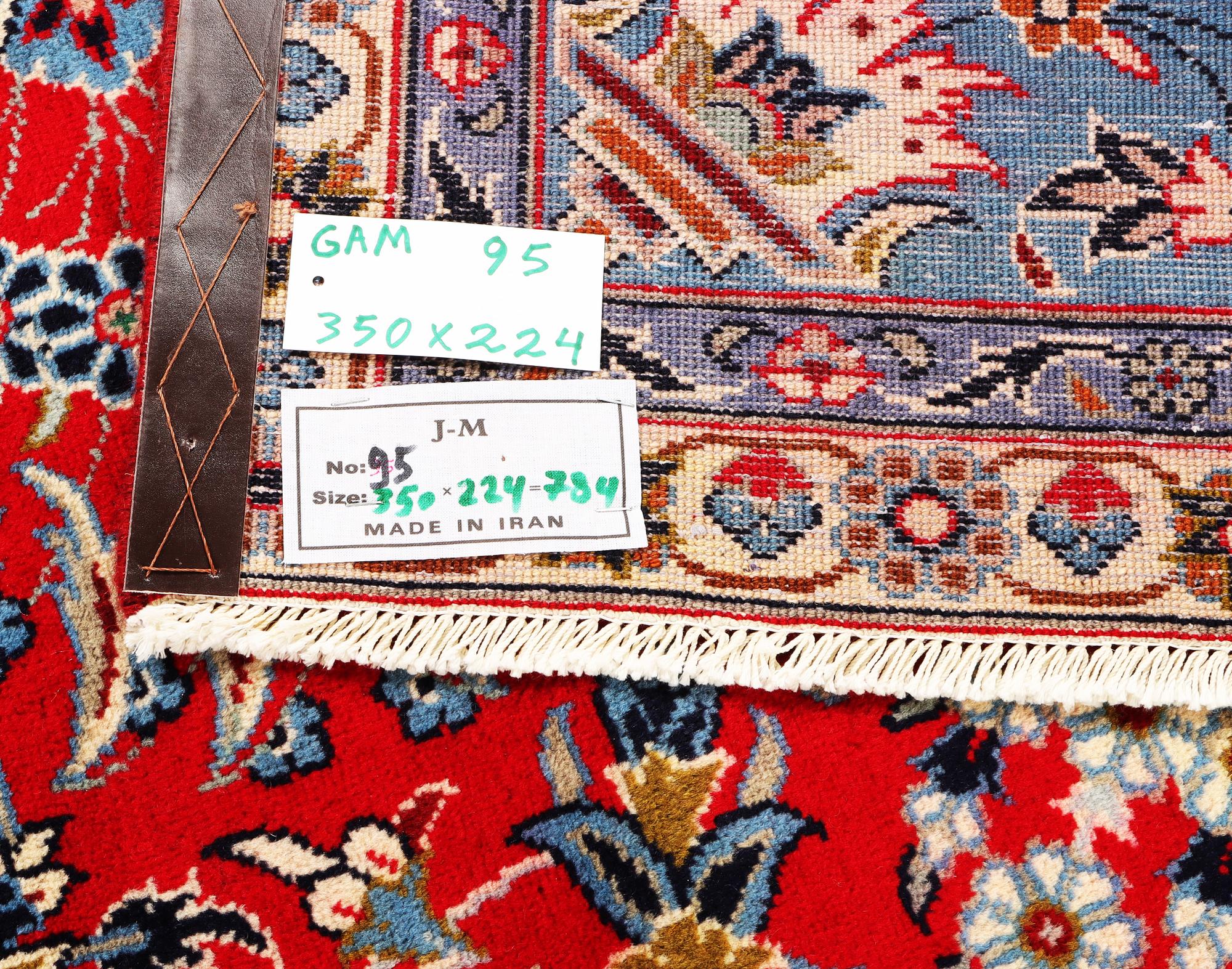 A Kashan carpet, c. 350 x 224 cm.