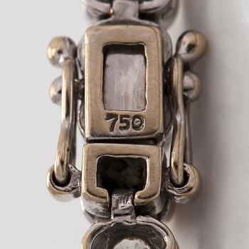 Tennisrannekoru, 18K valkokultaa, briljanttihiottuja timantteja.