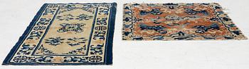 Two Chinese carpet fragments, late Qing dynasty.
