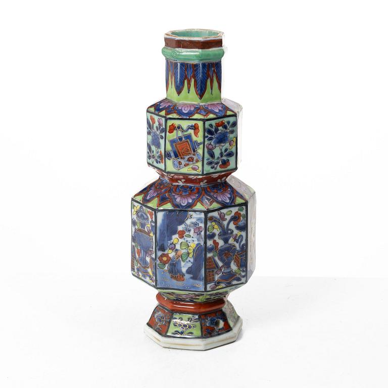 A 'clobbered' vase, Qing dynasty, Kangxi (1662-1722).