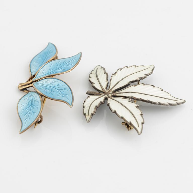 Two silver and enamel brooches, one by David Andersen, Norway.