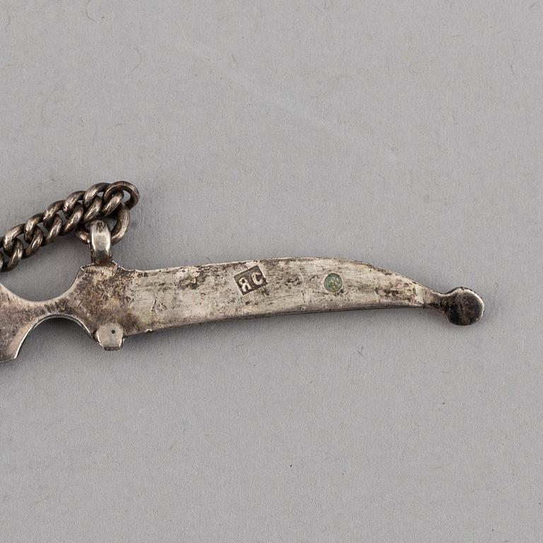 A Russian silver and niello bracelet and two belt buckles, unidentified makers mark, Kiev 1896-1908 and other.