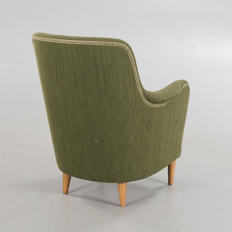 A "Samsas" armchair by Carl Malmsten.