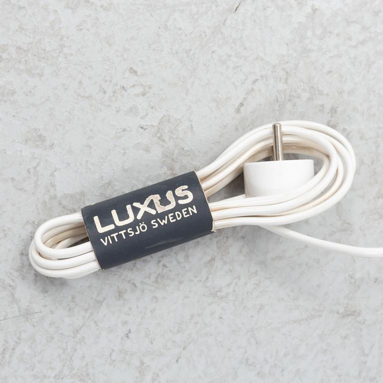 Uno & Östen Kristiansson, a pair of rosewood veneered floor lights, Luxus, Vittsjö, 1960's.