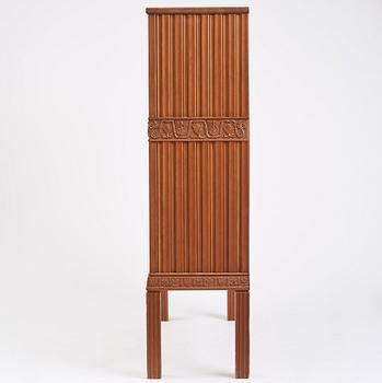 A Swedish Modern stained pine cabinet, 1940s.