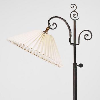 Harald Notini, a pair of wrought iron floor lamps, model "15101", Arvid Böhlmarks Lampfabrik, 1930s.