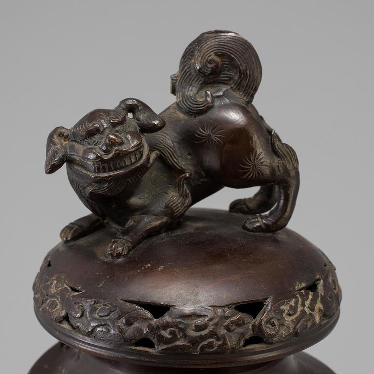 A Japanese bronze vase and cover, Meiji, late 19th century.