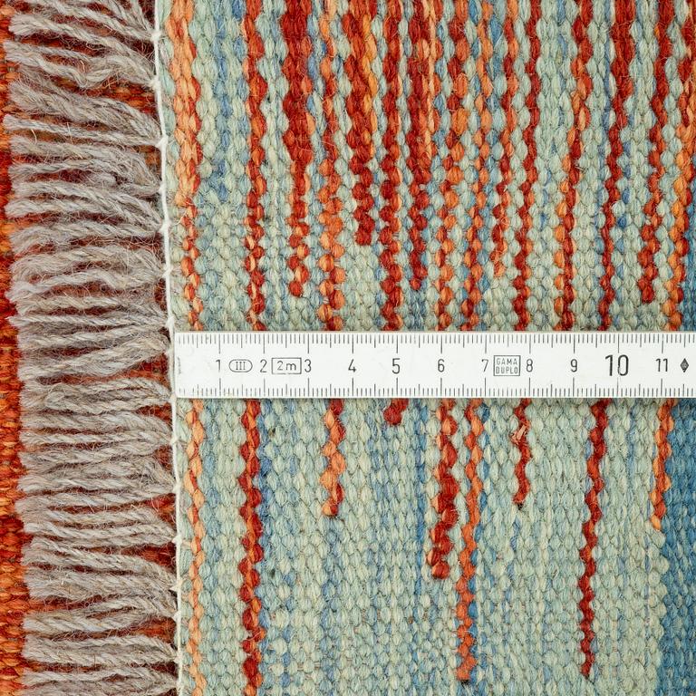 A kilim carpet 244 x 171 cm.