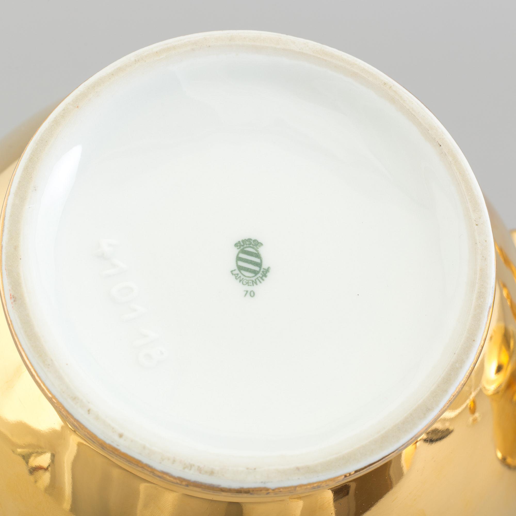 A mixed lot of thirteen pieces porcelain mostly Royal Worcester gold lustre, 20th century.