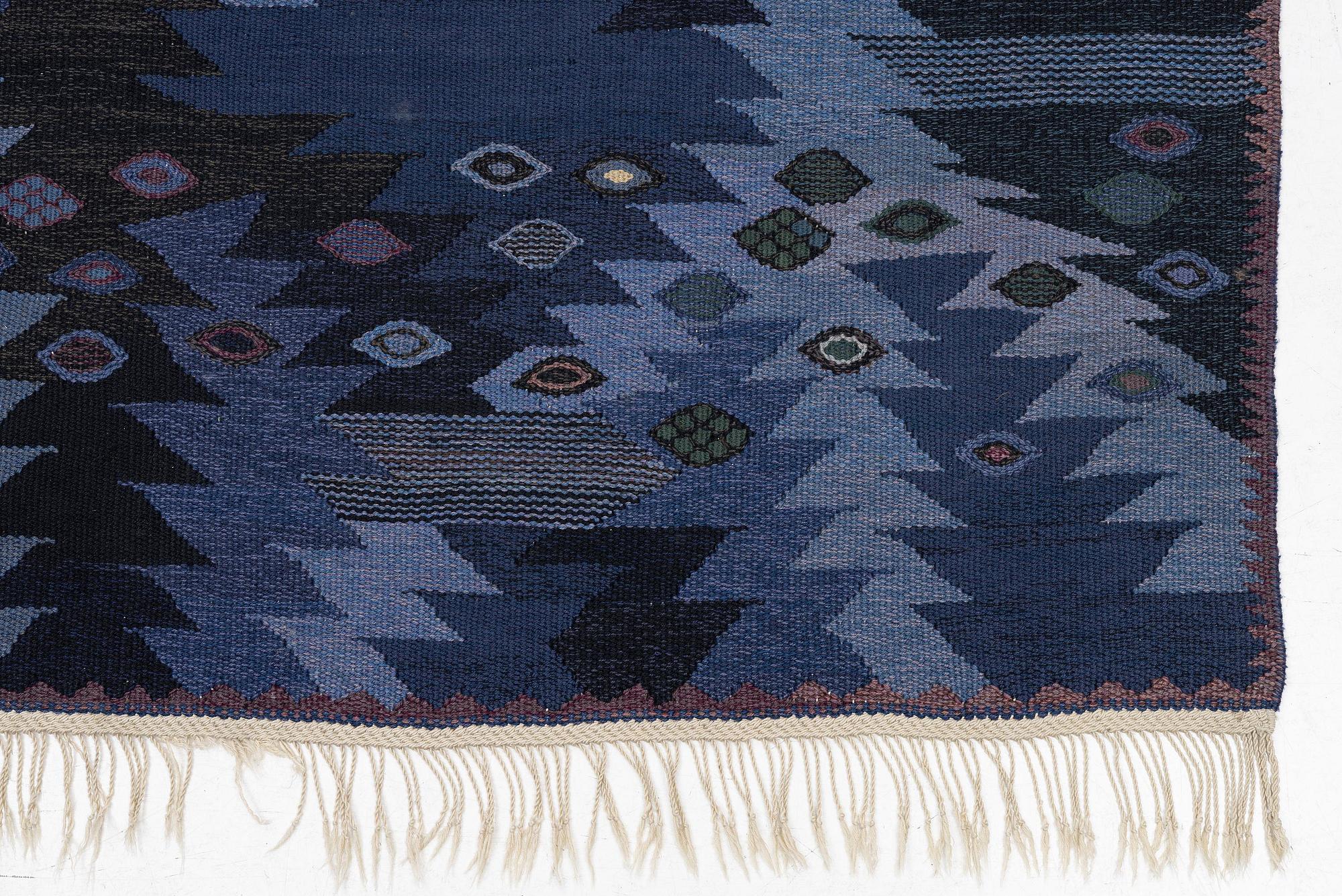 Barbro Nilsson, a carpet, 'Tånga blå', flat weave, c. 300 x 207 cm, signed AB MMF BN.
