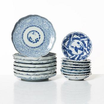A set with seven blue and white plates and eight small dishes, Japan, early 20th century.