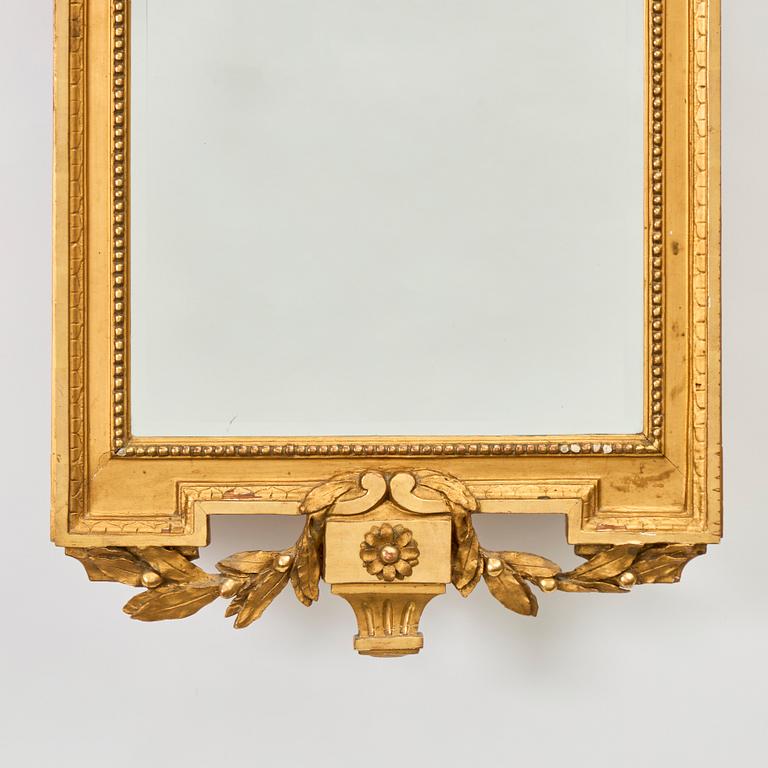 A Gustavian giltwoos mirror by J. Åkerblad (master in Stockholm 1758-99).