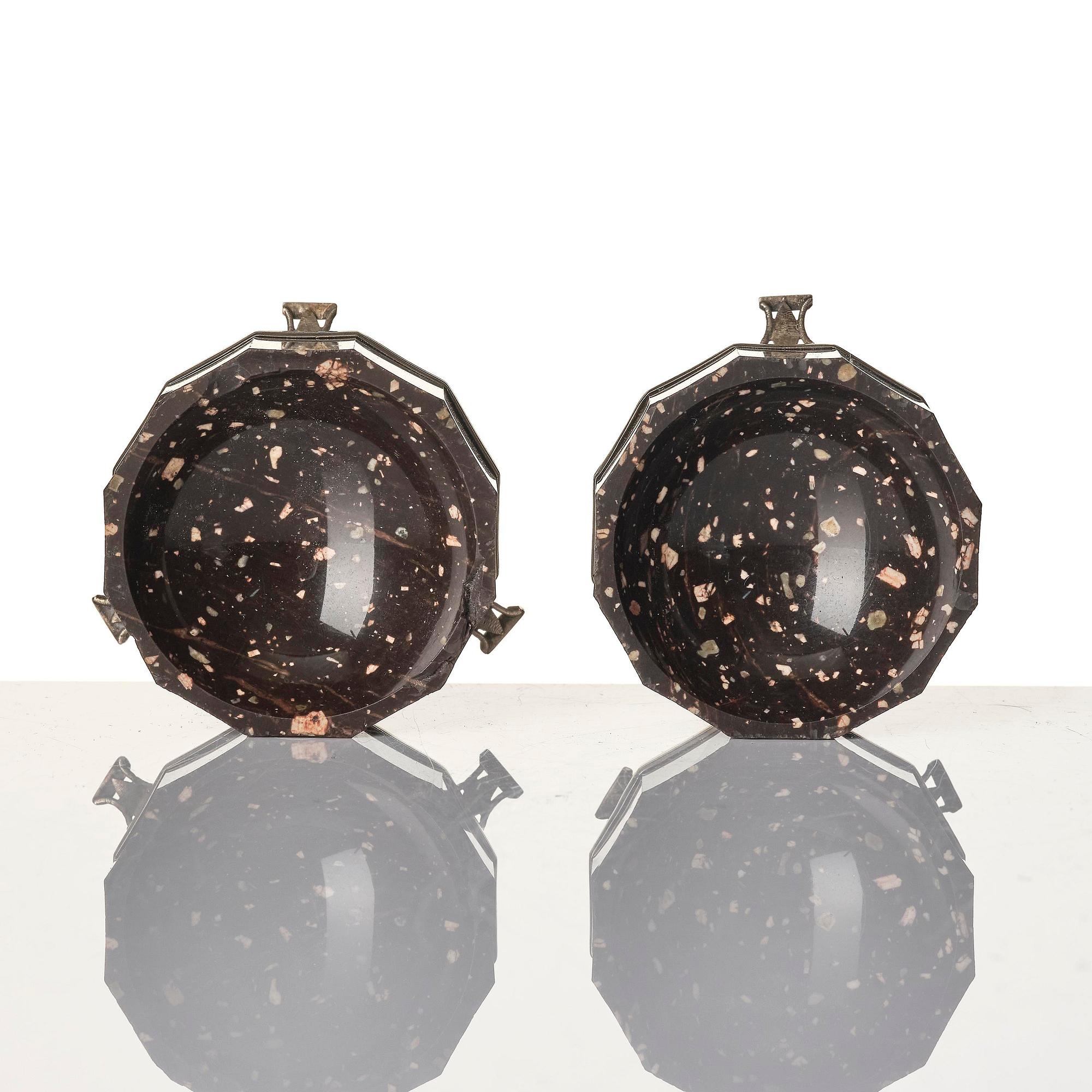A pair of 'Lika-Risberg' porphyry Empire salts, Älvdalen, Sweden, early 19th century.